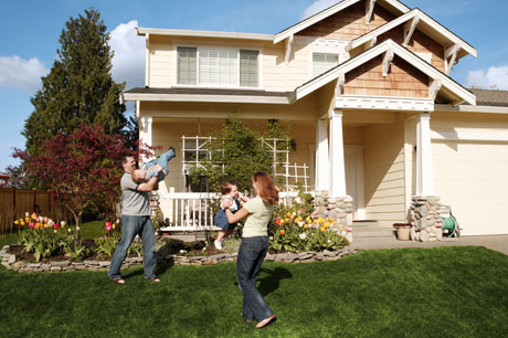 Family in Front of Home