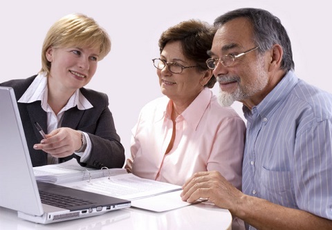 Couple Viewing Computer with Agent